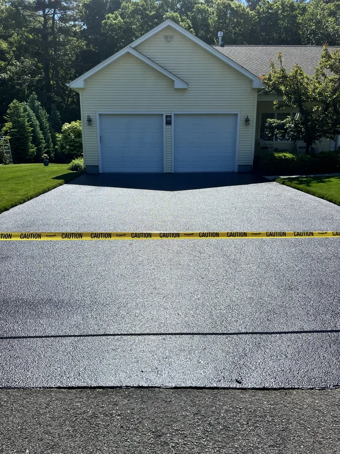 Fully sealed driveway including apron